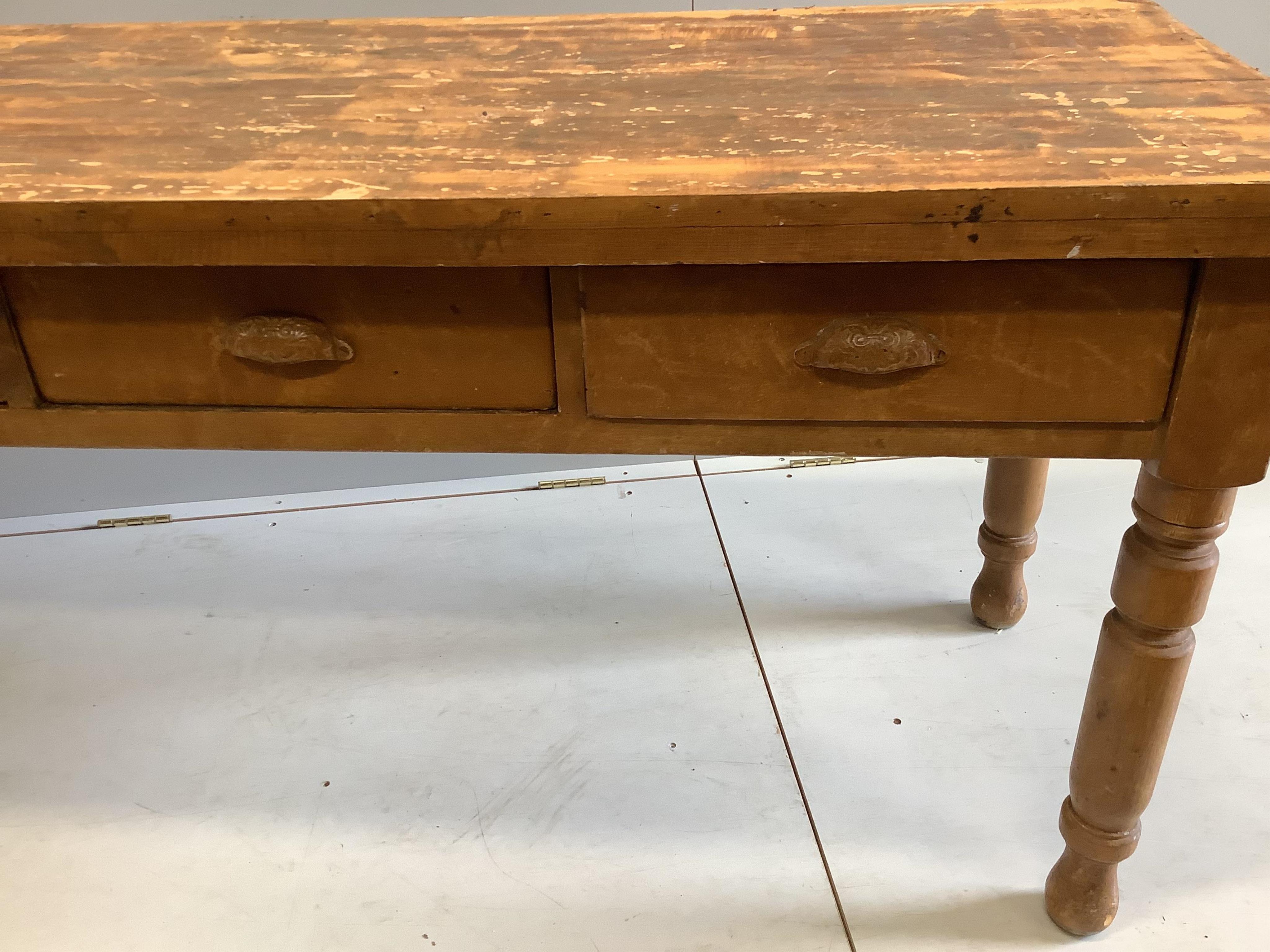 A Victorian rectangular pine kitchen table, width 197cm, depth 63cm, height 73cm. Condition - fair